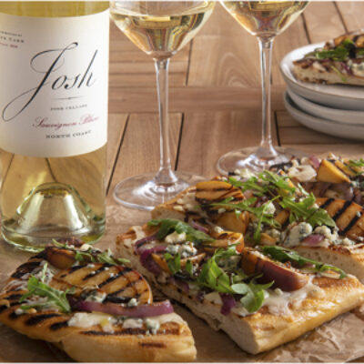 Grilled Pizza next to a bottle of Josh wines
