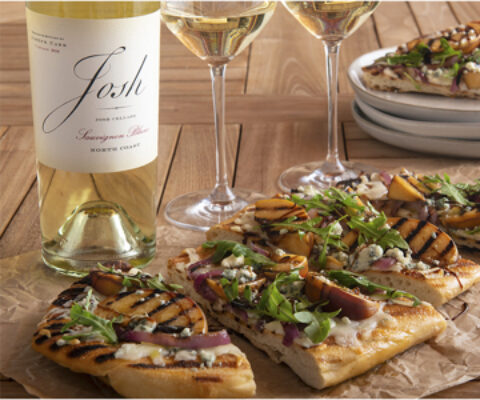 Grilled Pizza next to a bottle of Josh wines