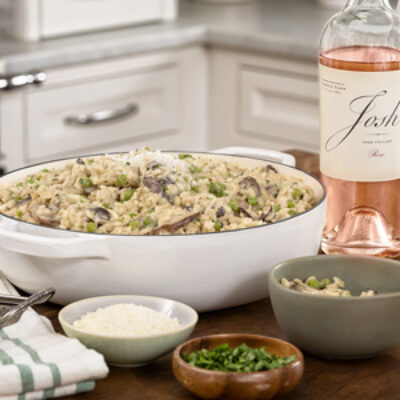 Wild Mushroom Risotto next to a bottle of Josh wines