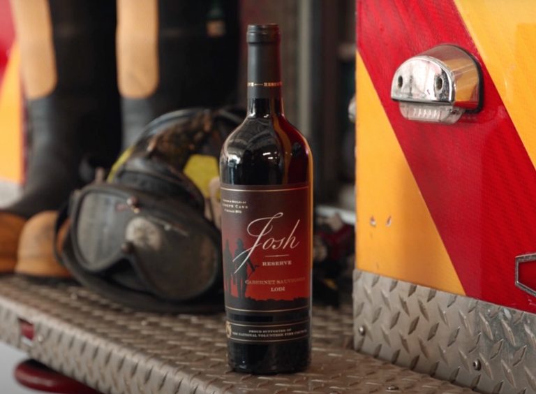 josh cellars reserve wine bottle on back of fire truck