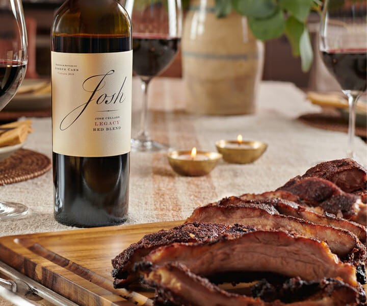 Sweet and spicy ribs along with a bottle of red wine