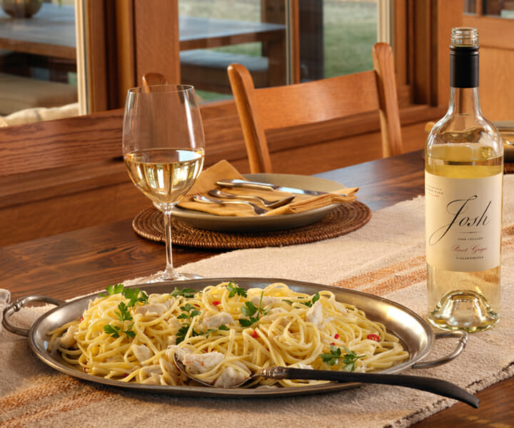 Spicy crab linguine and a bottle of white wine